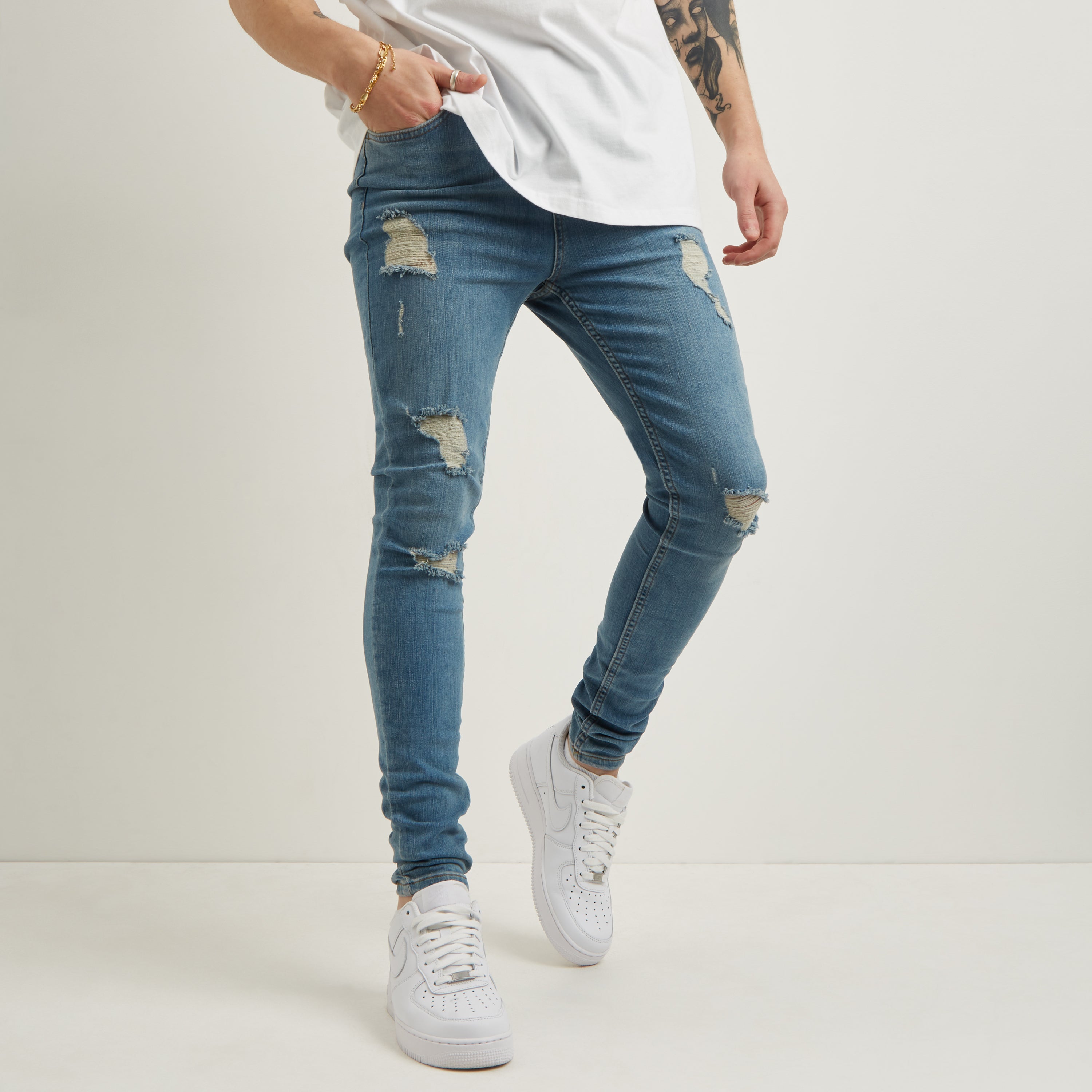 White spray sales on jeans mens